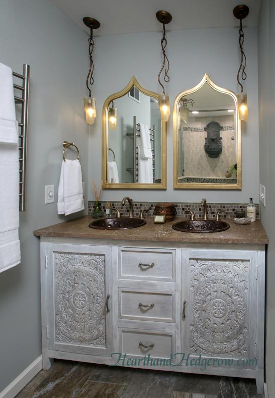 Gold Arched Mirrors with Pendant Lighting